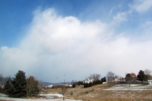 large cumulous cloud over Mt. Clinton village