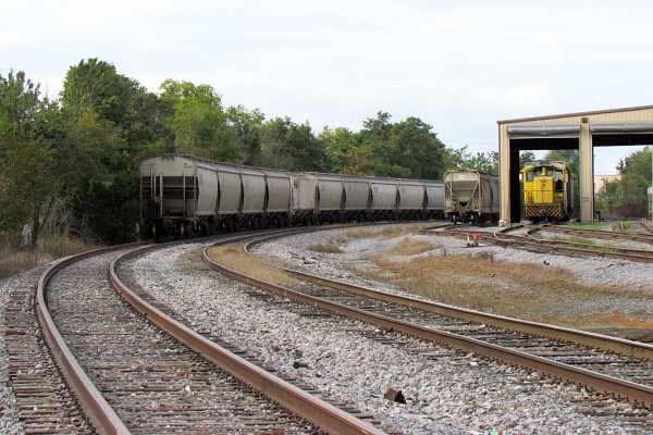 a board view of the grain cars and rail mover