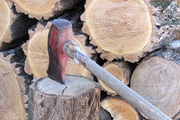 a maul and a wood pile