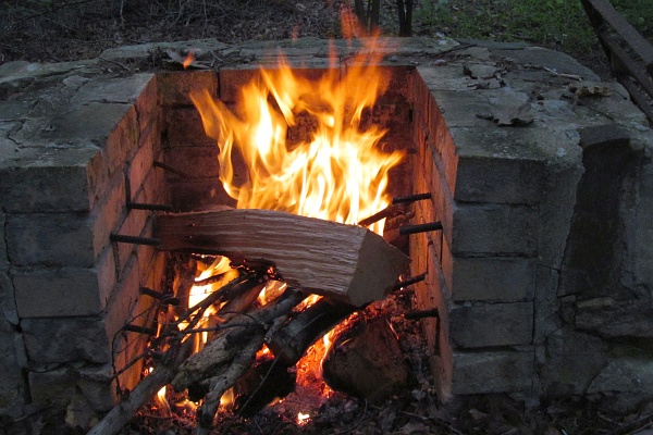 a camp fire to cook by at Highland Retreat
